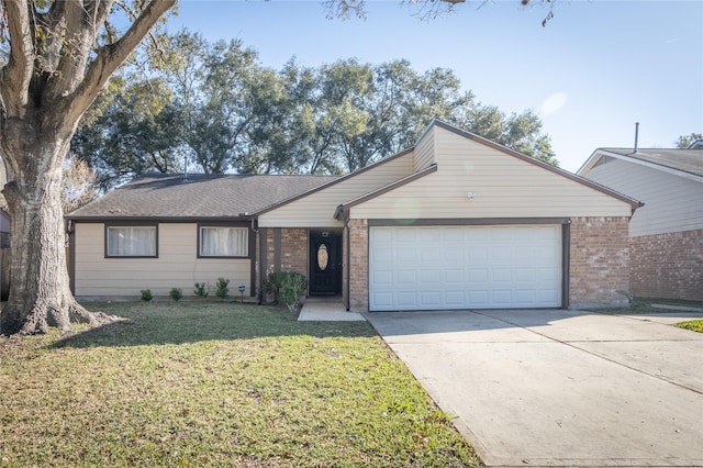 ranch-style house with a garage and a front lawn