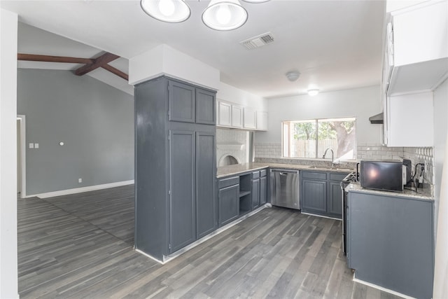 kitchen with gray cabinetry, dark wood-type flooring, lofted ceiling with beams, stainless steel dishwasher, and tasteful backsplash