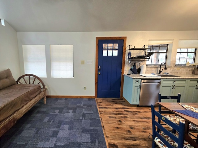 entrance foyer with dark hardwood / wood-style flooring and sink