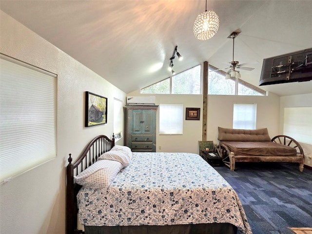 bedroom with dark carpet and lofted ceiling