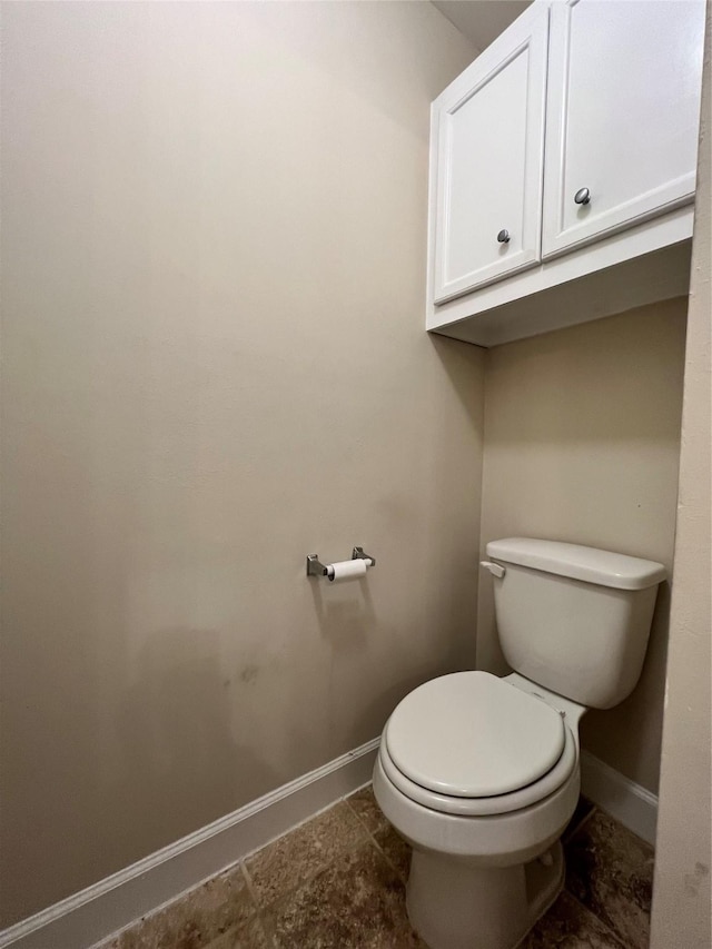 bathroom featuring toilet