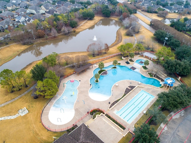 birds eye view of property featuring a water view