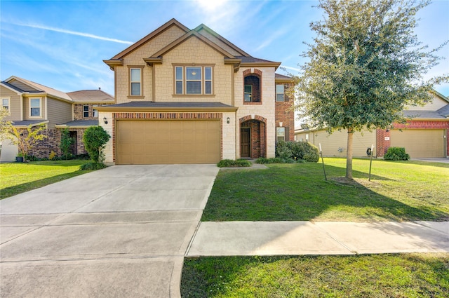 view of front of home featuring a front yard and a garage