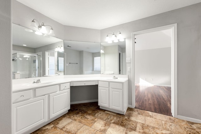 bathroom with vanity and walk in shower