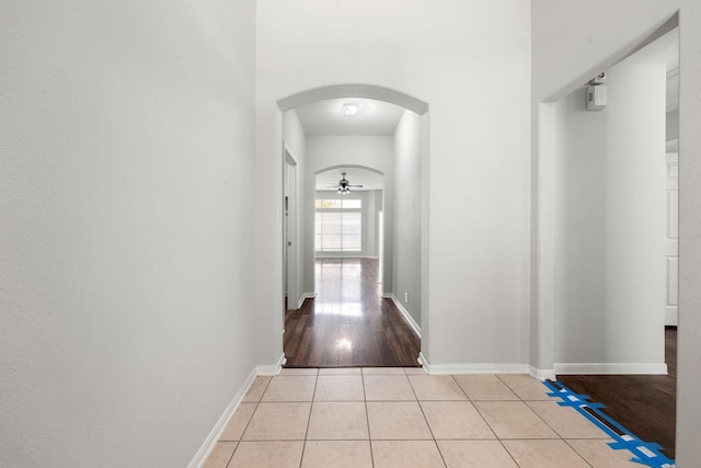 hall with light tile patterned flooring