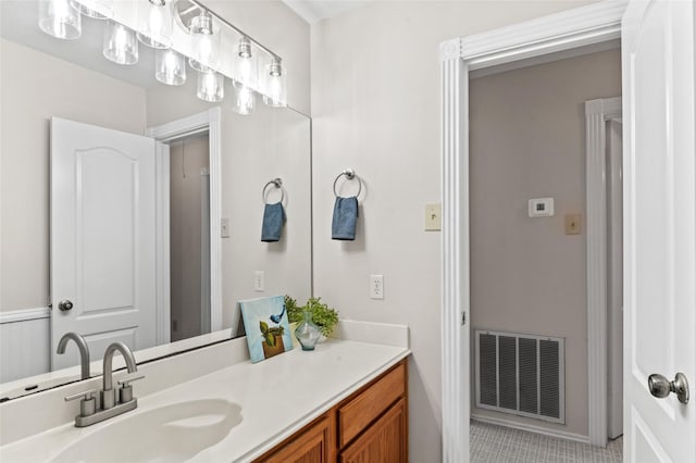 bathroom with vanity and tile patterned floors