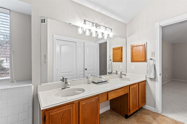 bathroom featuring tile patterned floors and vanity