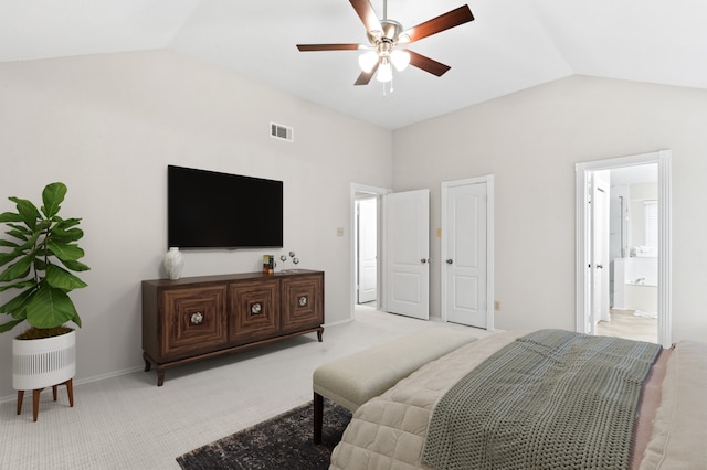 carpeted bedroom featuring ceiling fan, lofted ceiling, and connected bathroom