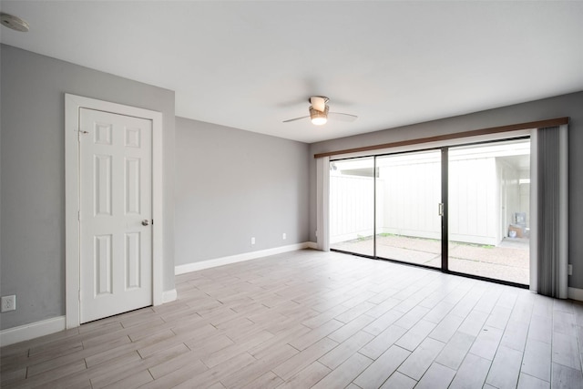 unfurnished room featuring ceiling fan