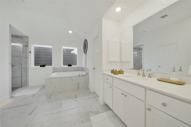 bathroom with shower with separate bathtub and vanity