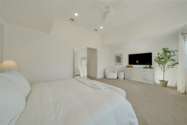 bedroom with ceiling fan, carpet, and crown molding