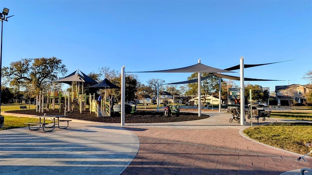 view of property's community featuring a playground