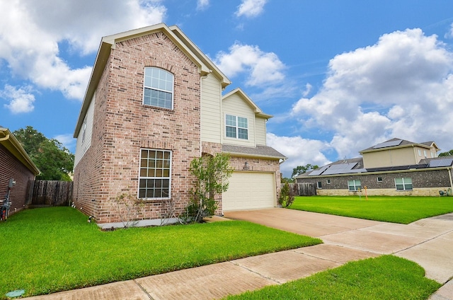 front facade with a front yard and a garage