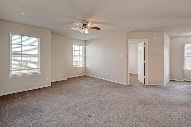 carpeted empty room with ceiling fan