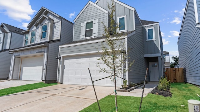 view of front of property with a garage