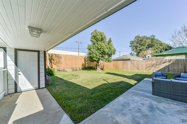 view of yard with a patio area and outdoor lounge area