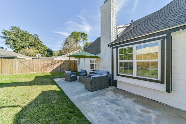 view of yard with a patio area and an outdoor living space