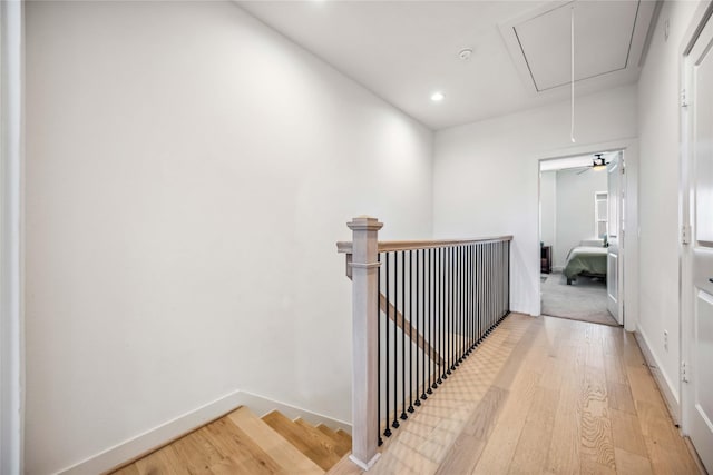 hall with light hardwood / wood-style flooring