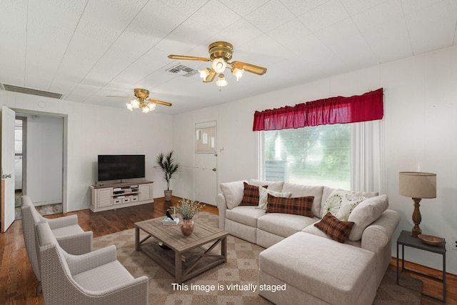 living room with ceiling fan and wood-type flooring