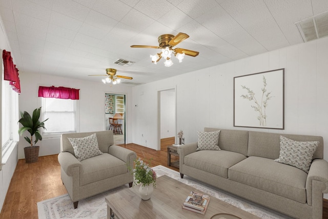 living room with light hardwood / wood-style floors