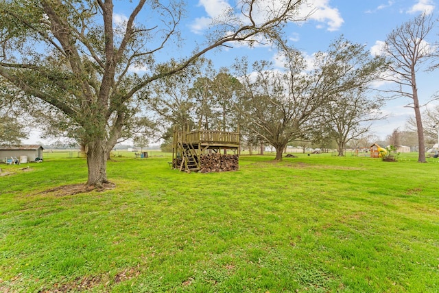 view of yard featuring a deck