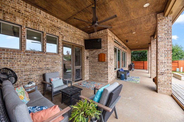 view of patio featuring outdoor lounge area and ceiling fan