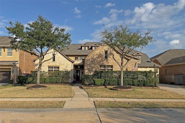 view of front of property with a front lawn