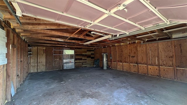 garage with wood walls