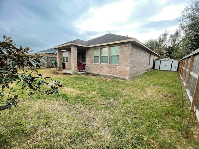 3238 Doves Nest Ct, Dickinson, TX 77539 - back of property featuring brick siding, a patio area, and a shingled roof