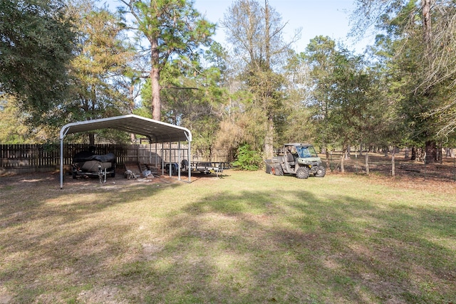 view of yard with a carport