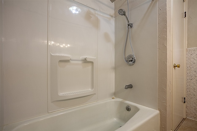 bathroom with shower / bathing tub combination and tile patterned floors