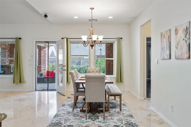 dining area with a chandelier