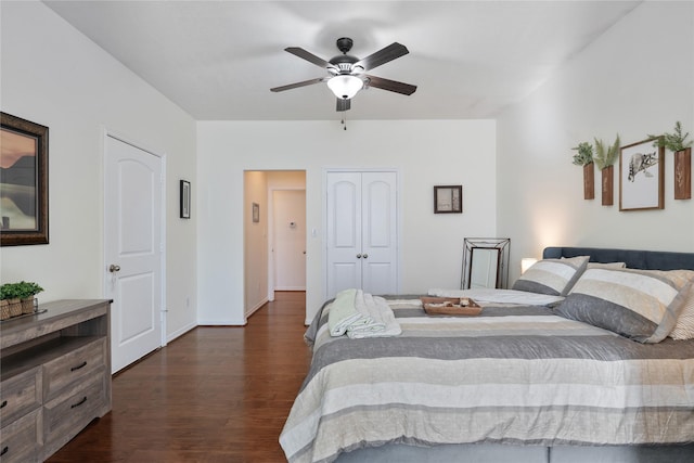 bedroom with ceiling fan and dark wood-type flooring