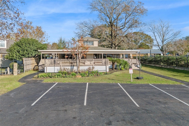 exterior space with a porch and a yard