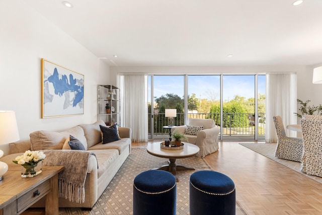 living room featuring parquet flooring and a wealth of natural light