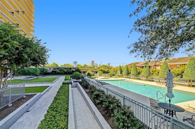 view of pool featuring a patio