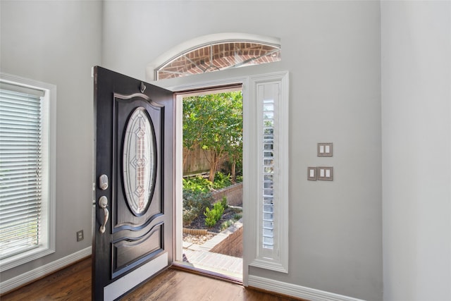 entryway featuring dark wood-type flooring