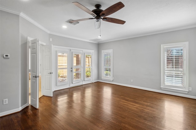 unfurnished room with crown molding, ceiling fan, and dark wood-type flooring