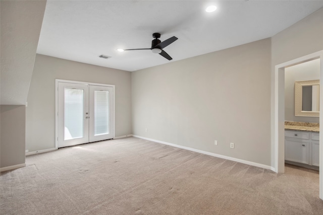 interior space with french doors and ceiling fan