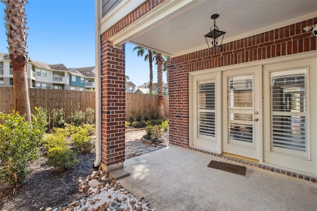 property entrance with a patio area