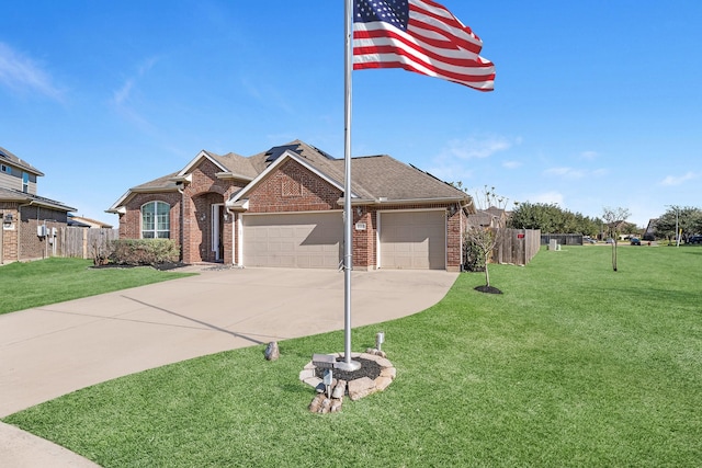 view of front facade with a garage and a front lawn