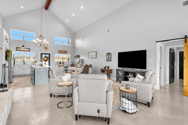 living room featuring beam ceiling, a barn door, high vaulted ceiling, and a notable chandelier