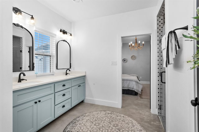 bathroom featuring vanity, concrete flooring, walk in shower, and an inviting chandelier