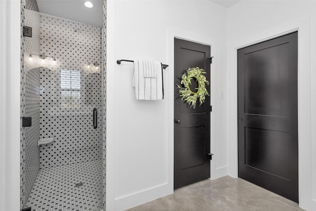 bathroom featuring concrete flooring and an enclosed shower