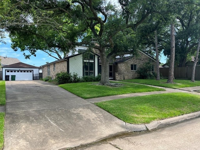 single story home with an outbuilding and a front yard