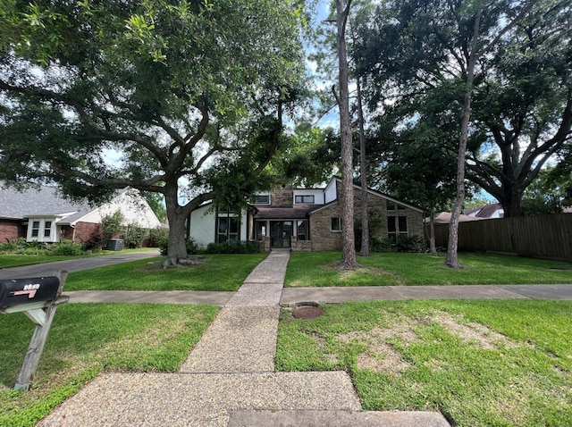 view of front of home with a front yard