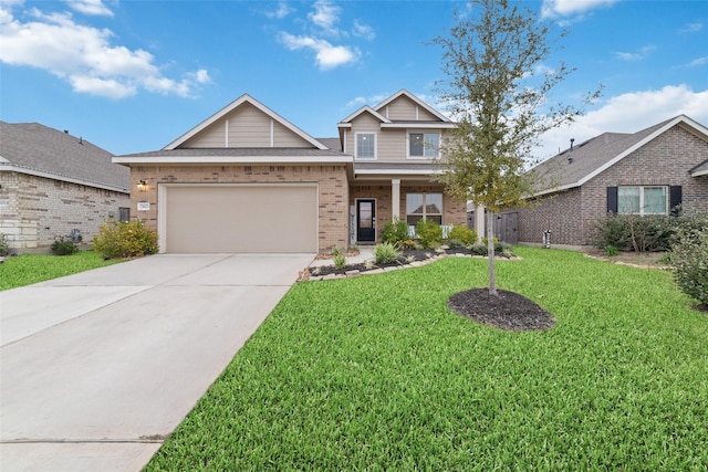 craftsman house featuring a garage and a front lawn