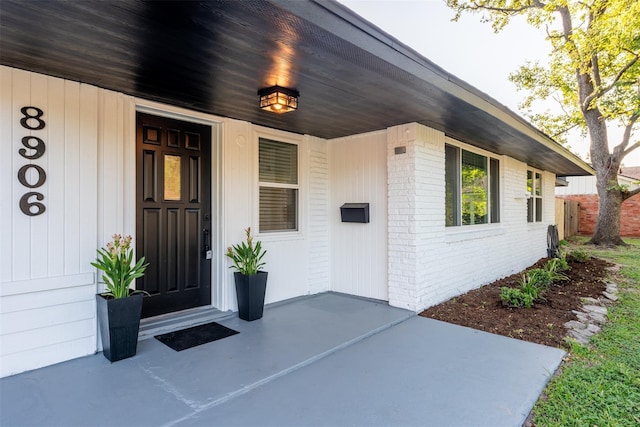 property entrance with a porch