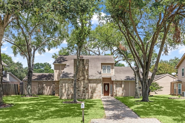 view of front of home with a front lawn