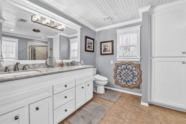 bathroom with tile patterned floors, crown molding, and plenty of natural light